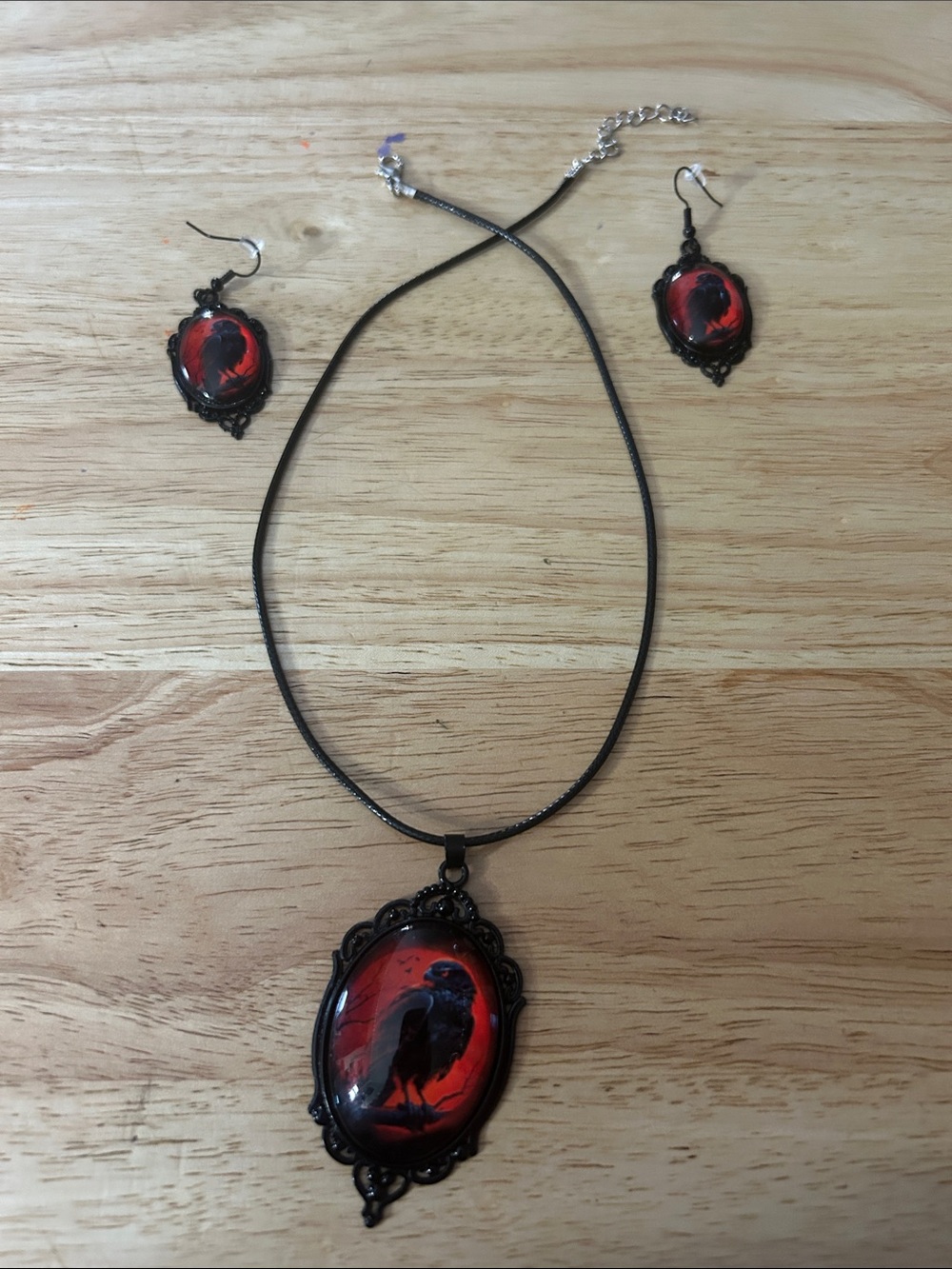 Black Frame Red Raven Pendant Necklace and Earrings Set